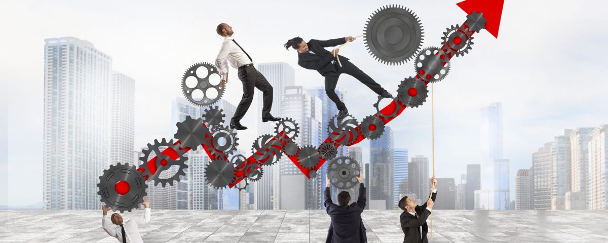 Teamwork build an arrow upwards with gears mechanism